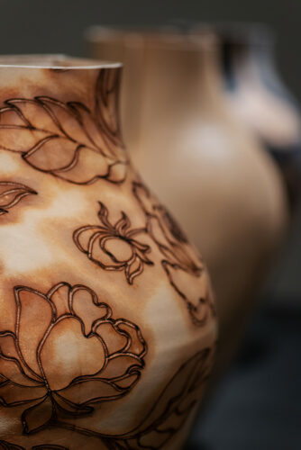 Talia Luvaton, Genuine Leather, wet forming, tattooing, laser etching, rust dyeing<br />
Vase size: 27X45 cm<br />
Tattoo artist: Amit Kaplan<br />
Photography: Neta Cones